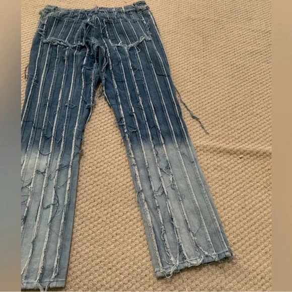 Lightly worn Frayed distressed denim jeans in a size 30 (9 US)